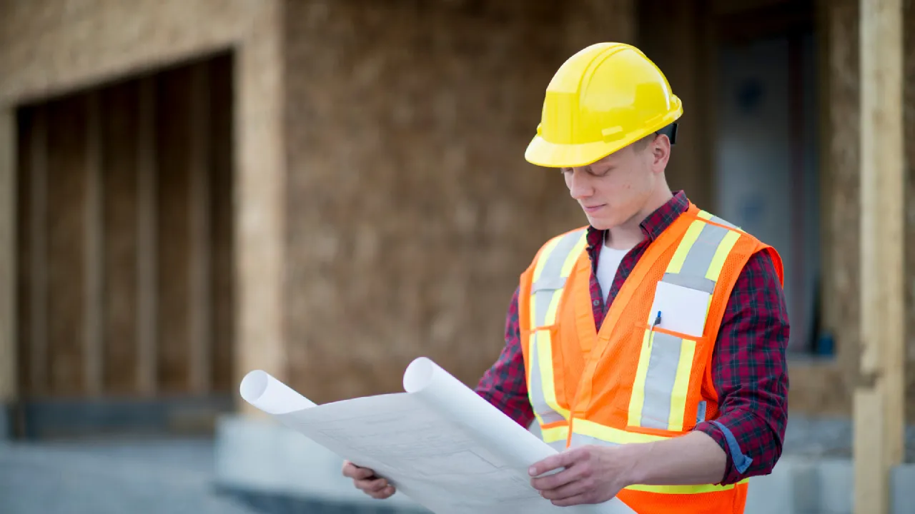 A contractor Looking at the Building Permits
